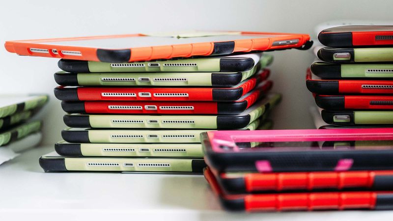 stack of iPads used for education