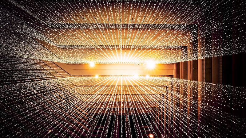 An abstract image of a tunnel of dots representing the flow of data