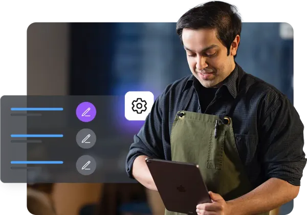 A worker in an apron is focused on a tablet screen showing options for editing and settings. This suggests on-the-job device management or customization, powered by Jamf.