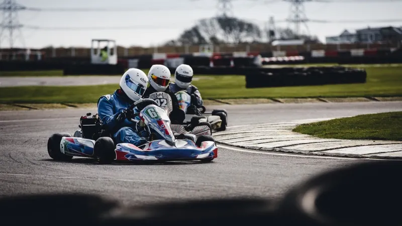 Kart racing on a race track