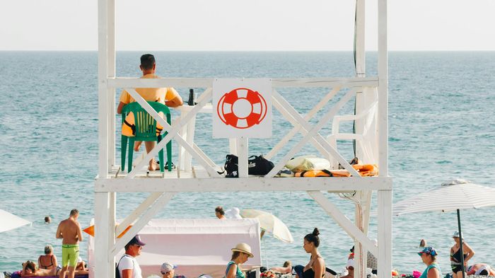Lifeguard watches over swimmers at the beach like Jamf safeguards devices on your network