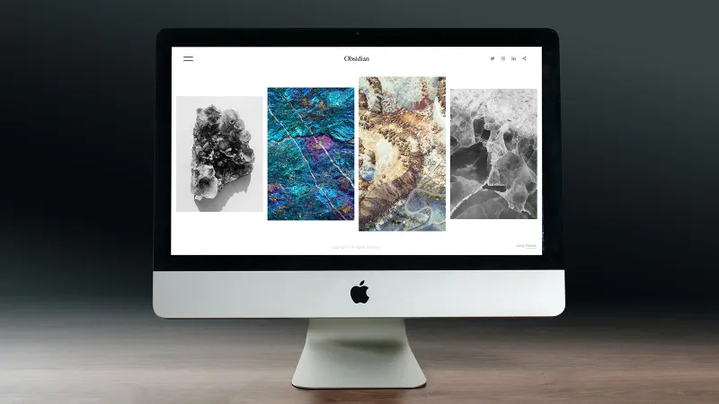 A Mac computer displaying colorful images