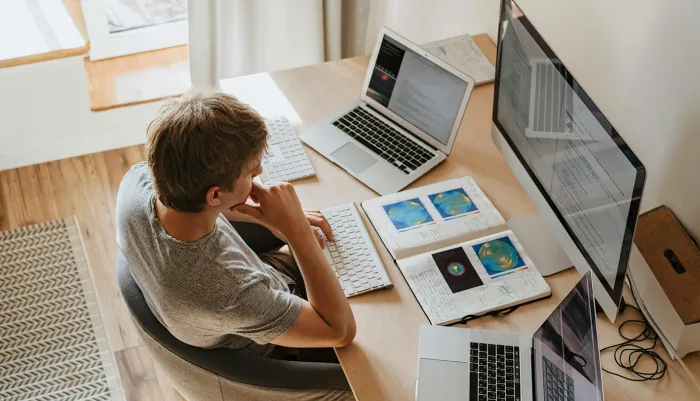 IT pro learning remotely how to manage and secure Apple devices with Jamf.