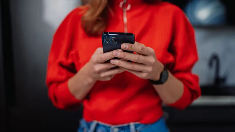Person using BYOD iPhone enrolled in Jamf Pro