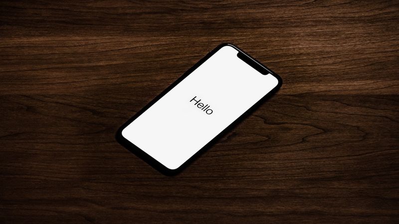 iPhone sitting desk with