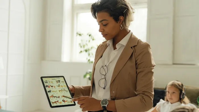 Teacher using an iPad managed by Jamf School