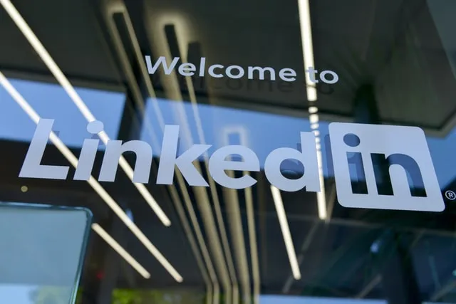 Window with a LinkedIn logo/sign that reads