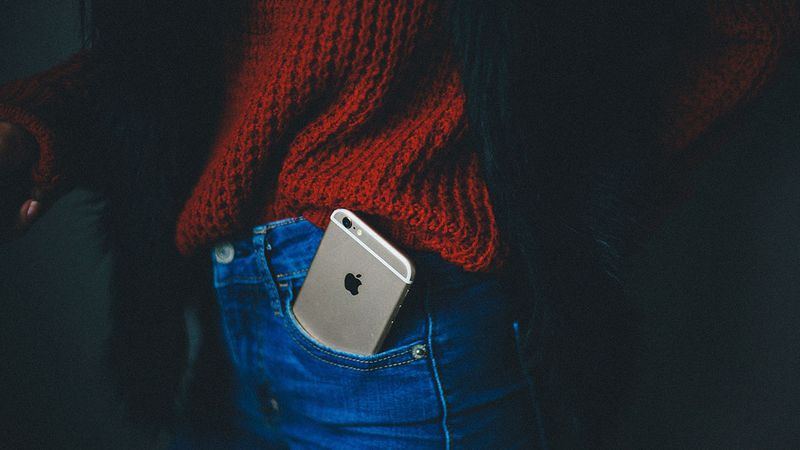 An iPhone in a person's pocket: BYOD