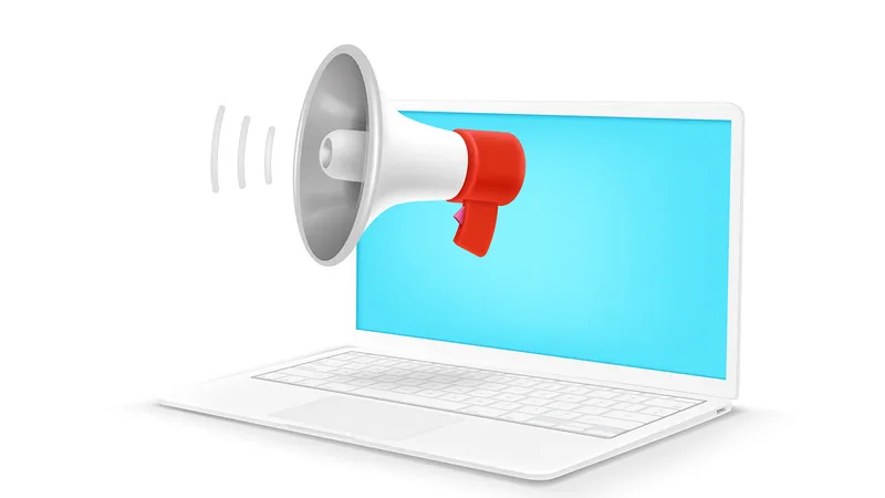 Image of laptop with bullhorn.