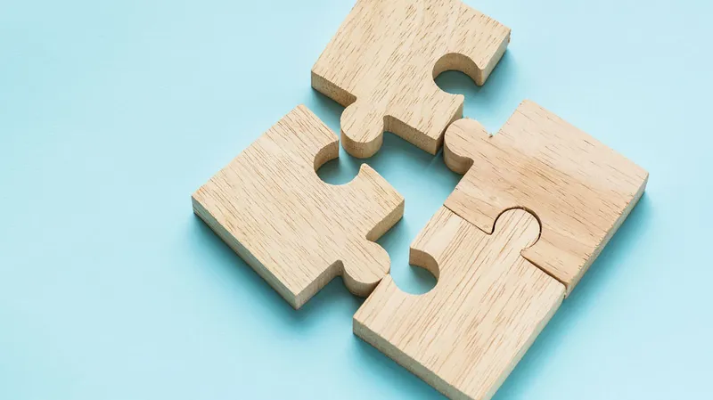 Multiple puzzle pieces connecting together.