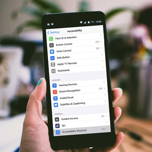 iPhone on the accessibility settings screen.
