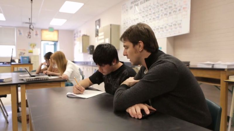 Aaron Sams speaks with a student in his classroom, introducing us to the flipped classroom educational model.
