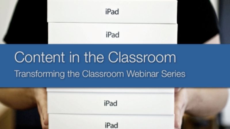 A person holds a stack of iPad boxes to illustrate Jamf's Transforming the Classroom series: Content in the Classroom webinar.